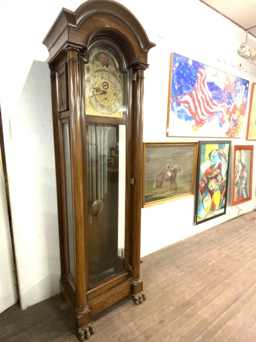 Elliot London Grandfather Clock With 9 Chimes: English grandfather clock with nine chimes by ELLIOTT London. All workings present. Weights and key present. Door key missing. The clock bottom needs repair as weights fell into it. Dimensions: 92" h 