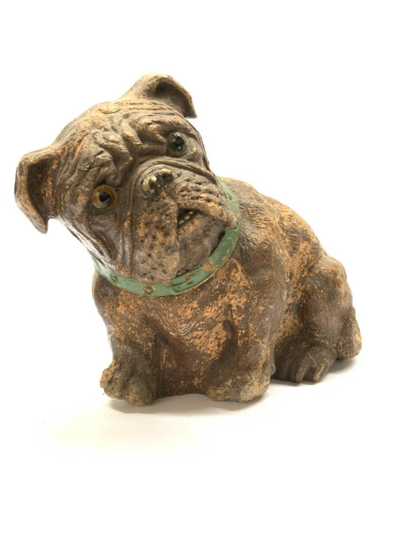 Antique Composition Bull Dog: An antique composition bull dog statue with glass eyes. . Dimensions: 7 1/2” X 7” X 4” Some edge wear and paint loss noted. Please see photograph preview or call.