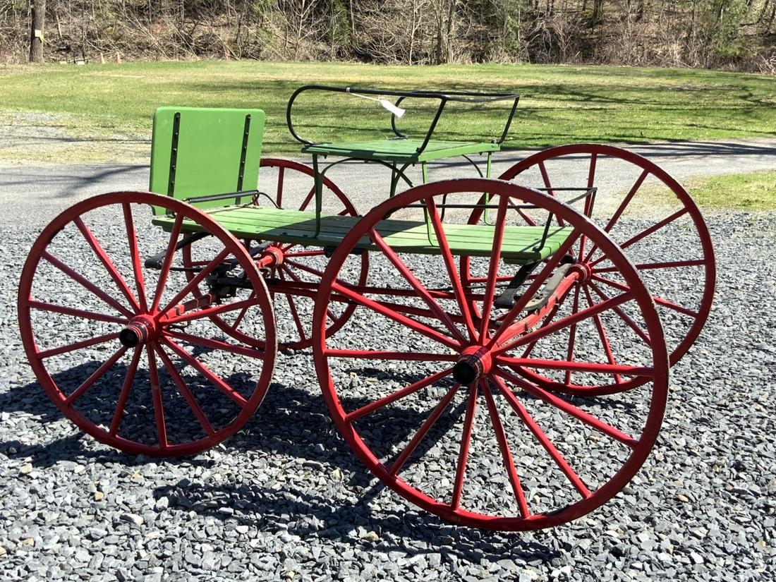 Vintage Pony Cart: Operational and recently restored and freshly painted Pony Cart. Dimensions: 41”h x 74” x 51”