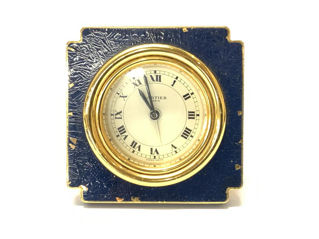 Cartier, Paris Travel Alarm Clock: Cartier, Paris travel alarm clock. Finish loss noted. Please see photograph preview. Dimensions: 3” x 3”