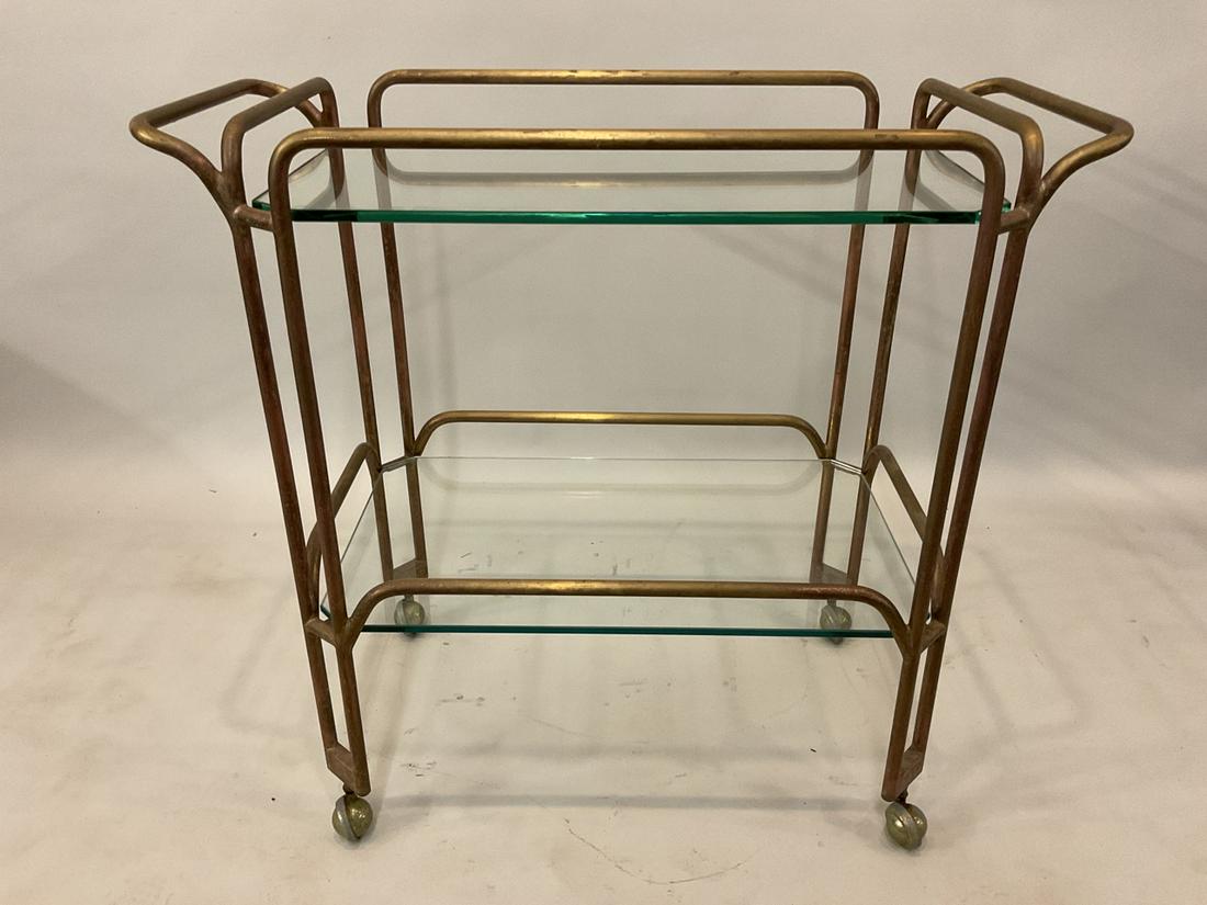 Art Deco Two (2) Tier Brass Tea Cart: Art Deco two (2) tiered brass tea cart. Dimensions: 29 7/8” x 33” x 16”