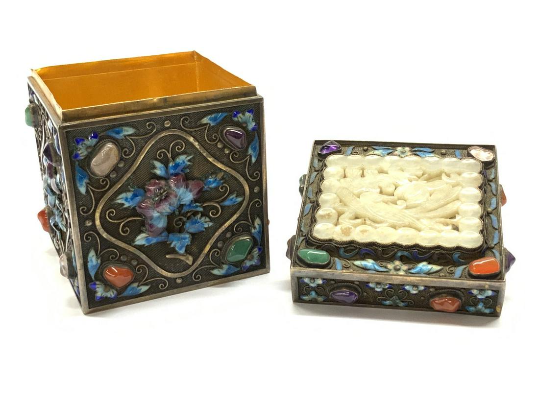 Chinese Silver Box: Chinese silver jeweled box. Outstanding vermeil sterling silver with enamel work and encrusted crystal, jade, carnelian and amethyst stones. Dimensions: 4 1/2" X 3" X 3 1/4" Total weight: 19.7786 troy