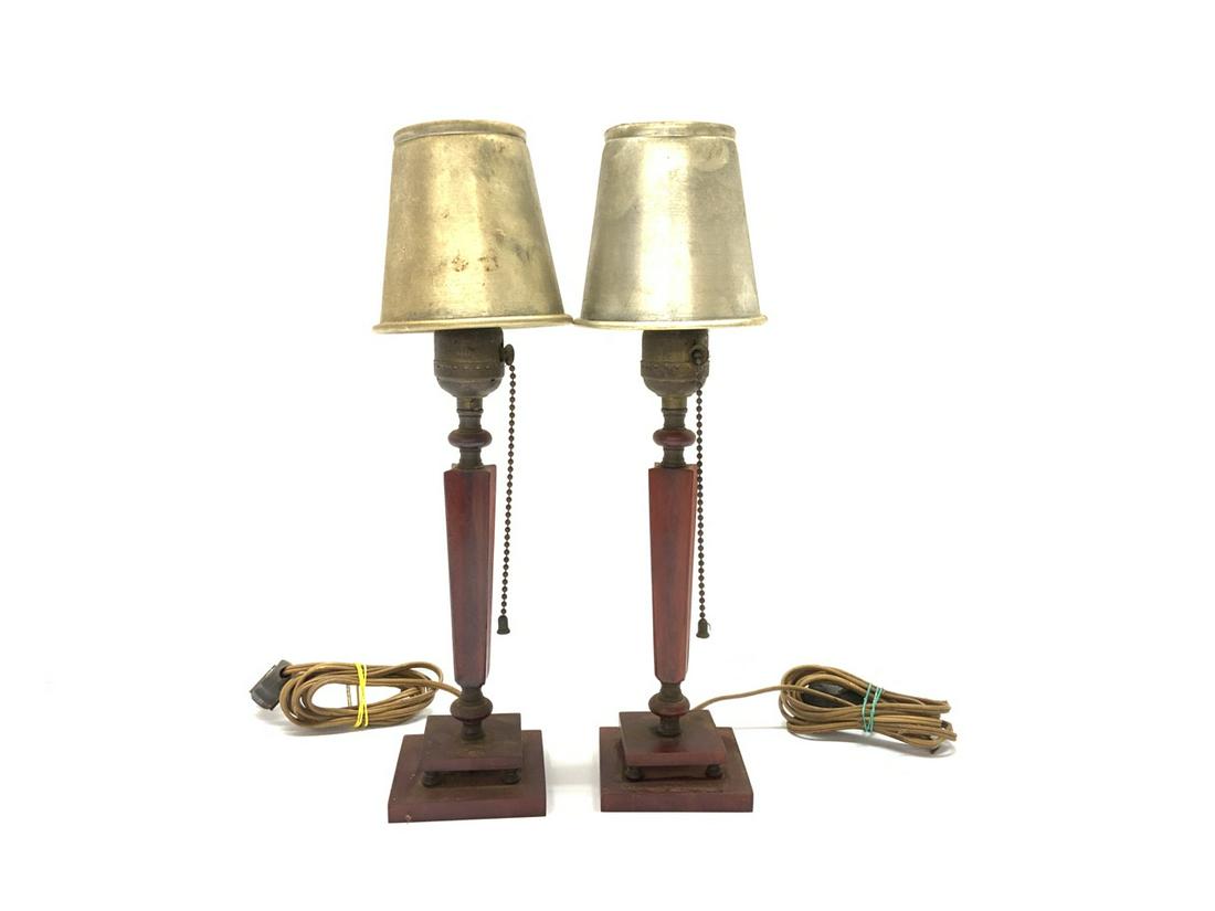 Cherry Bakelite Boudoir Lamps w/ Tin Shades: A pair of cherry bakelite boudoir lamps with tin shades. Dimensions: 14.5”