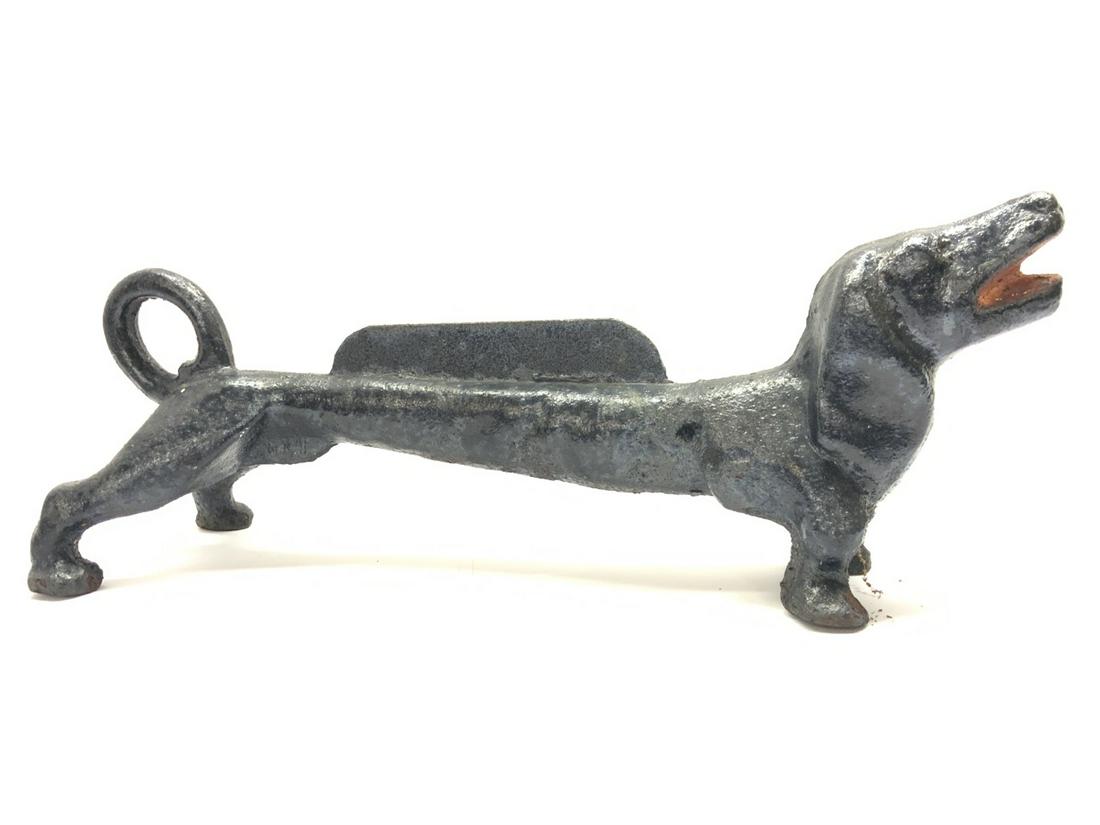 Cast Iron Dachshund Garden Boot Scrape: A cast iron Dachshund boot scrape. Dimensions: 21” x 6” x 7 1/2”