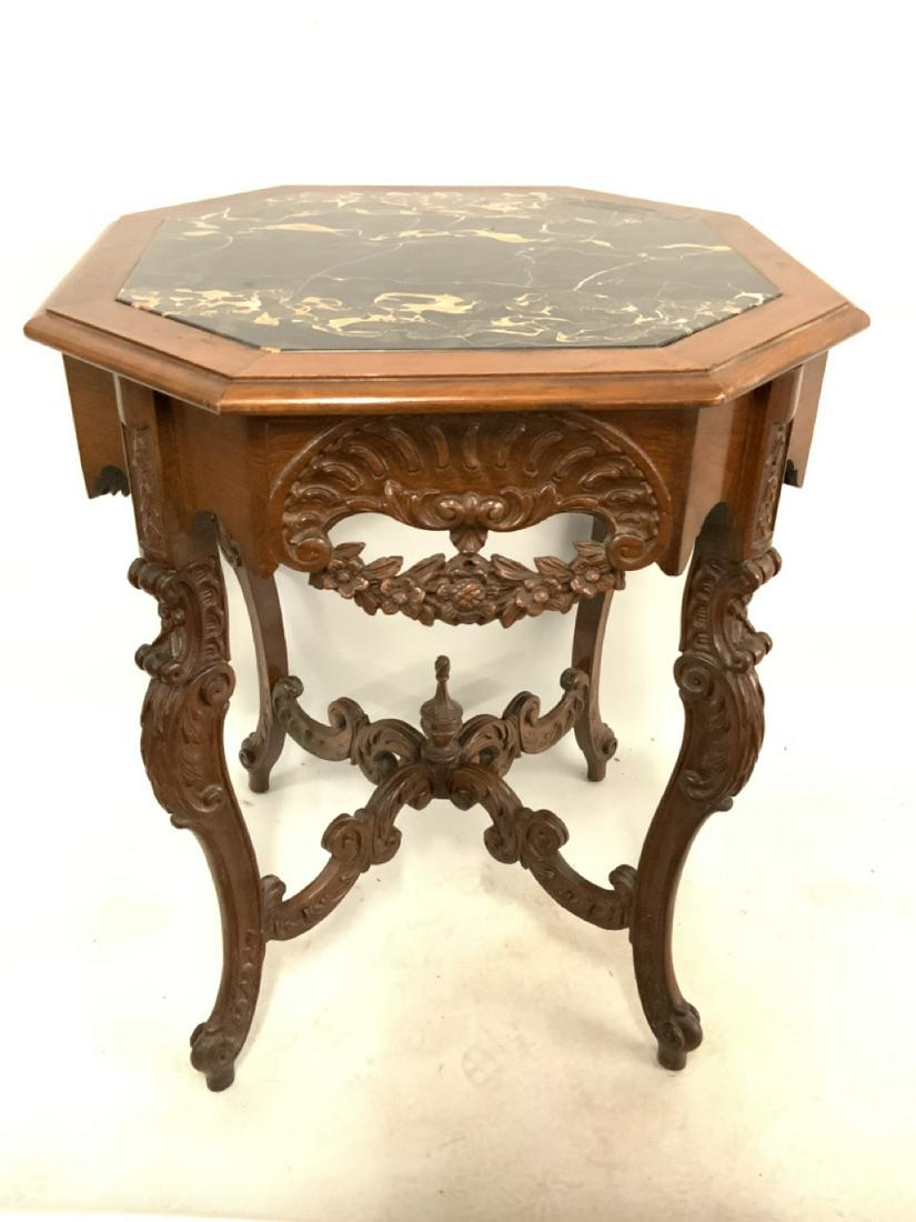 Fancy Marble Top Round Table: A fancy carved marble top round table. Early 20th century. Probably Italian. Dimensions: 30” x 25”