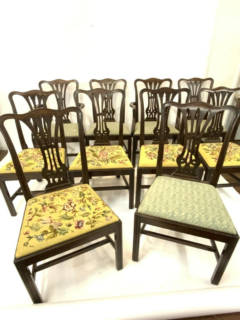 Set of Ten (10) Signed English Chippendale Style Chairs: Set of ten (10) English Chippendale Style Dining Room Chairs. Eight Side and Two Arms. Signed. Dimensions: 38"h X 21" X 17"