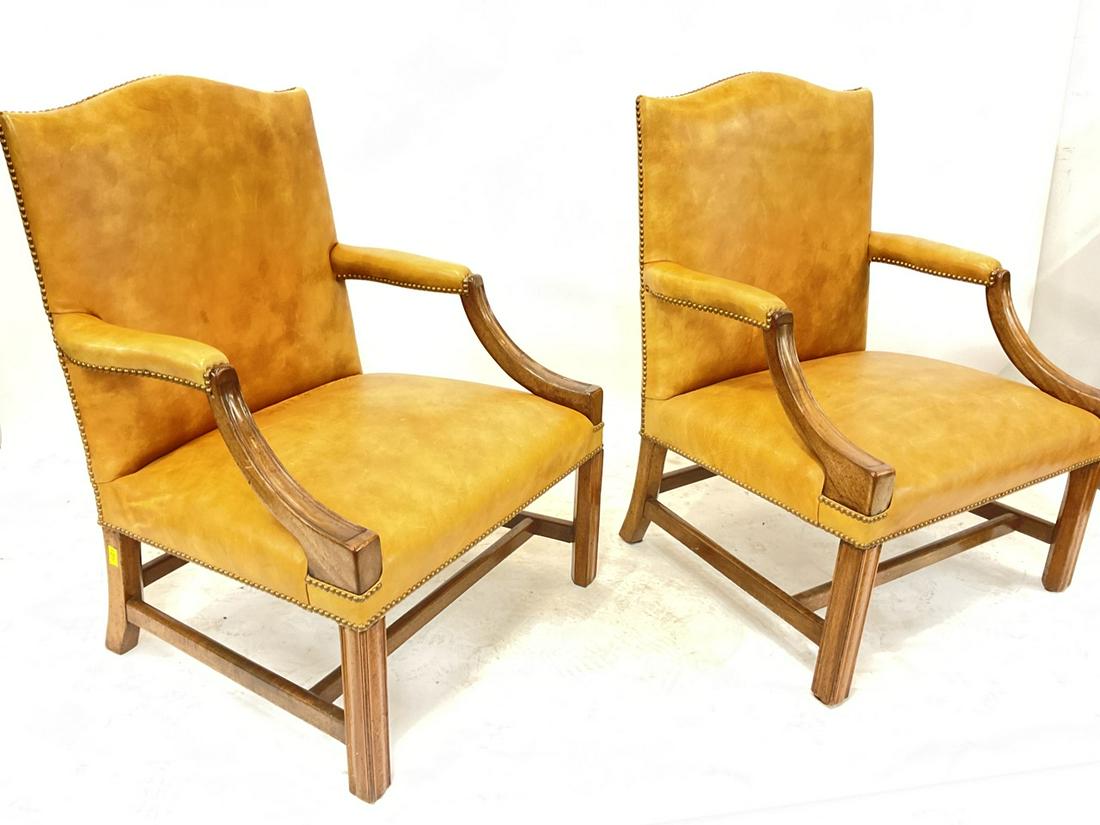 A Pair, Edwardian Leather Stuffed Oversized Arm Chairs: Exceptional pair of oversized Edwardian style studded leather arm chairs. Dimensions: 38" X 28" X 25"