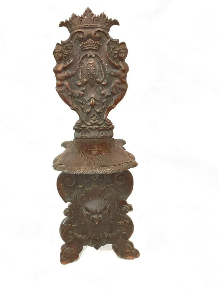 Medici Family "Sgabello" Chair: Sgabello carved chair, Italian, 19th century. Bears the Medici Family Coat Of Arms. Dimensions 48 1/2” x 17” x 18”