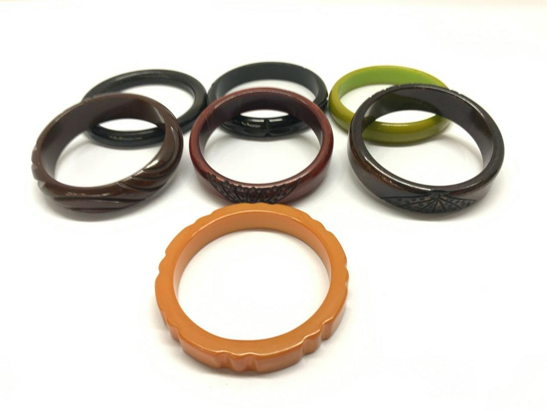 Seven (7) Bakelite Bangle Bracelets: Seven (7) Bakelite Bangle Bracelets. Browns, light orange, green etc.