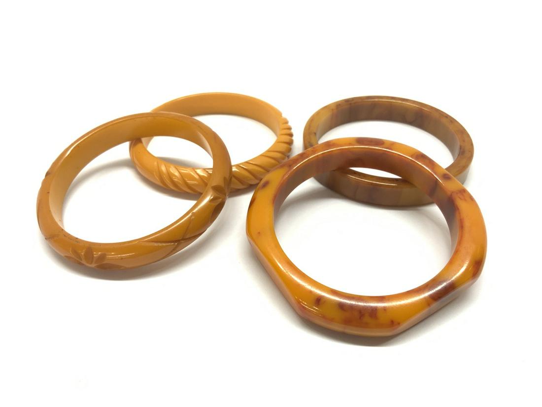 Four (4) Bakelite Bangle Bracelets: Four (4) Bakelite Bangle Bracelets. Butterscotch, marblelized caramel etc.