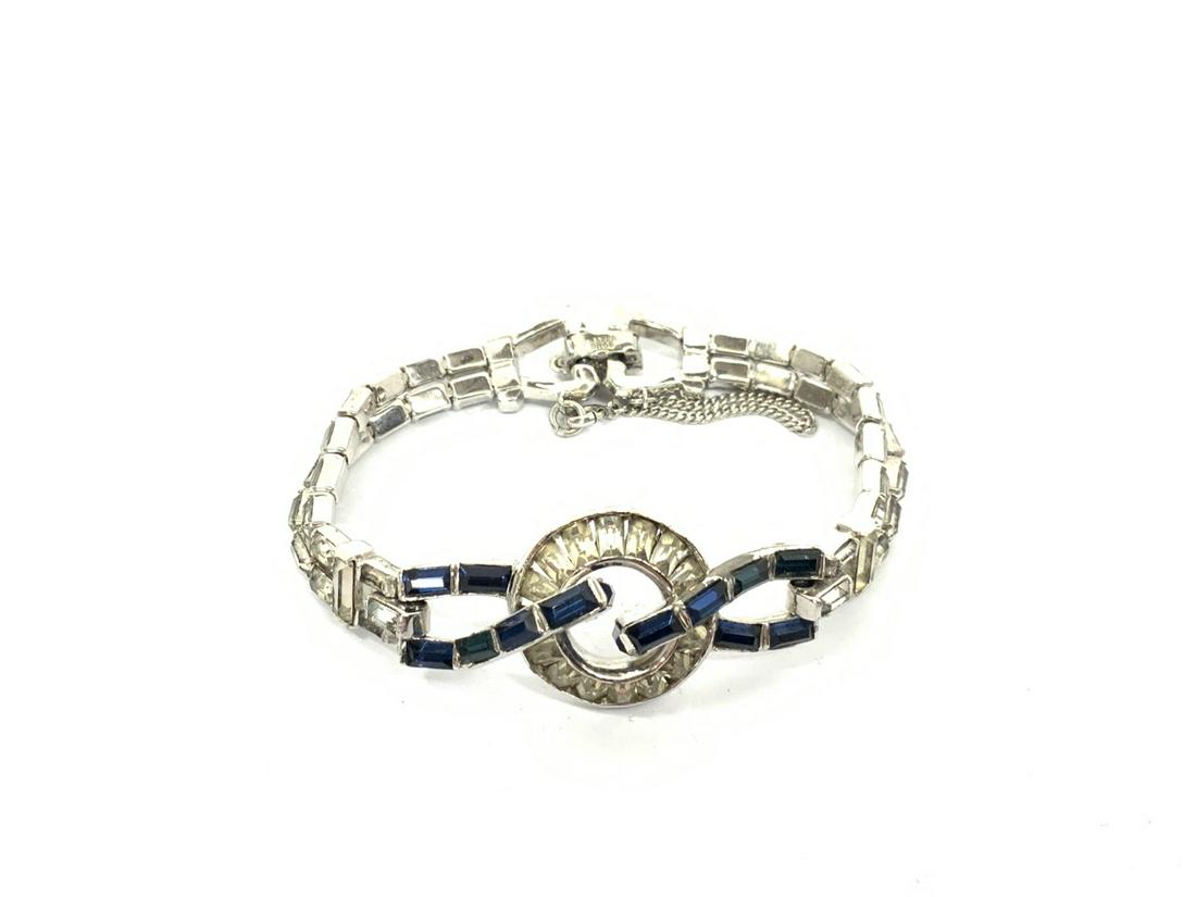 Vintage Mazer Bros Costume Bracelet: Early Mazer Bros. Evening ware costume bracelet. Faux diamond rhinestones and blue sapphire. Dimensions: 7" length. Signed.