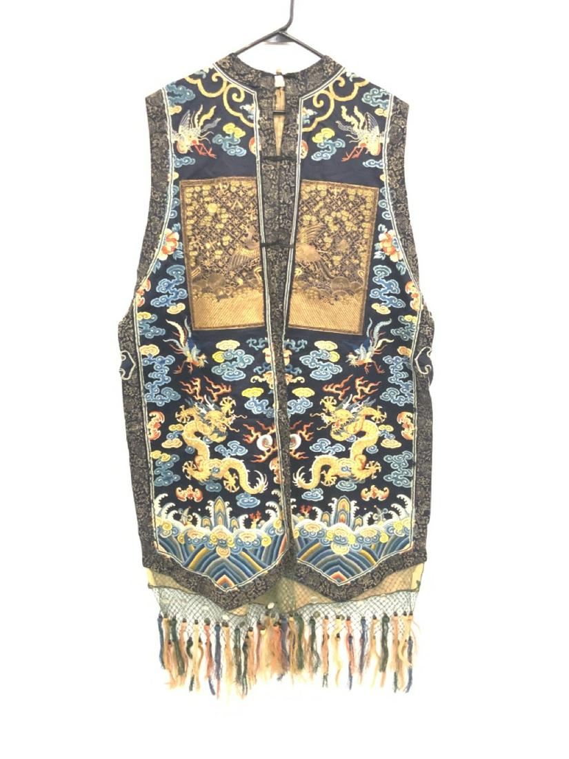 Exceptional Antique Silk Embroidered Robe Kimono: An exceptional antique silk embroidered robe or Kimono. Sleeveless example. Dimensions: 49 1/2” L
