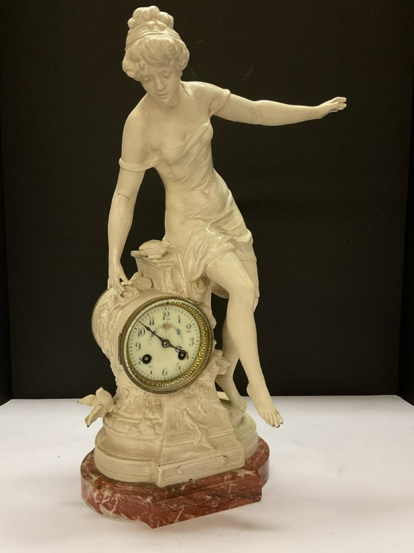 Samuel Marti Antique French Figural Clock: Samuel Marti French figural clock. Titled: Les Fauvettes with sierra marble base. Dimensions: 21” x 8 1/2” x 7”