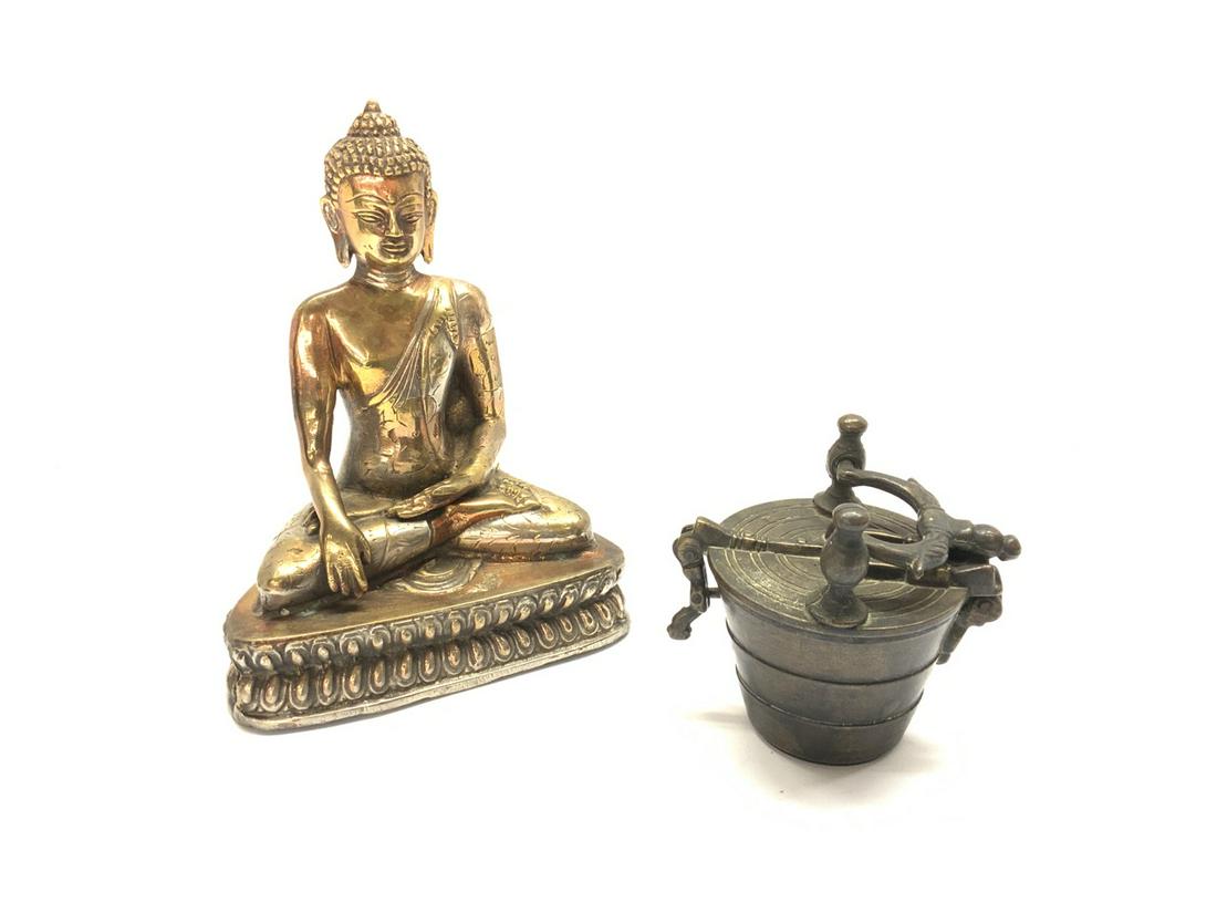 Two (2) Estate Objects, Tibetan: Tibetan metal statue and brass nesting weights set. Dimensions: 7 3/4" x 6"