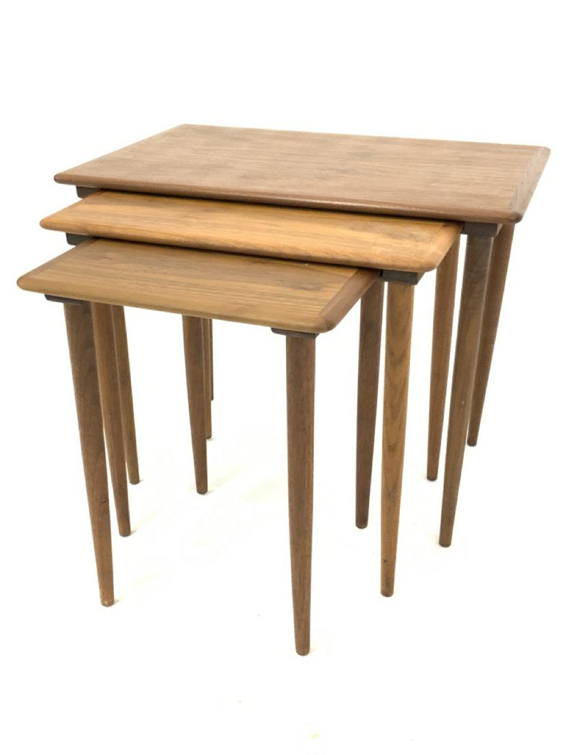 Three (3) Danish Mid-Century Nesting Tables: A set of three Danish modern nesting tables. Dimensions: 19” x 23” x 15.5”Denmark, Mid 20th Century.