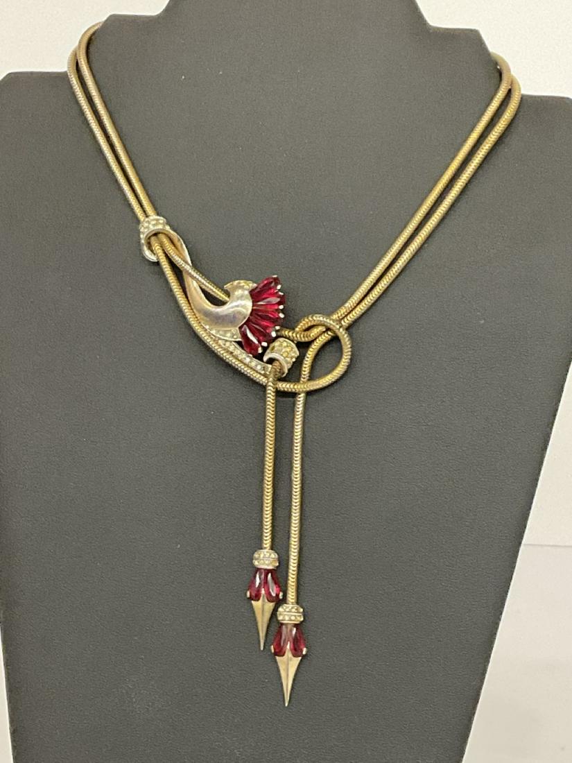 Signed Marcel Boucher Necklace: Signed Marcel Boucher goldtone necklace with ruby rhinestones. Some light corrosion present. Please see photograph preview.