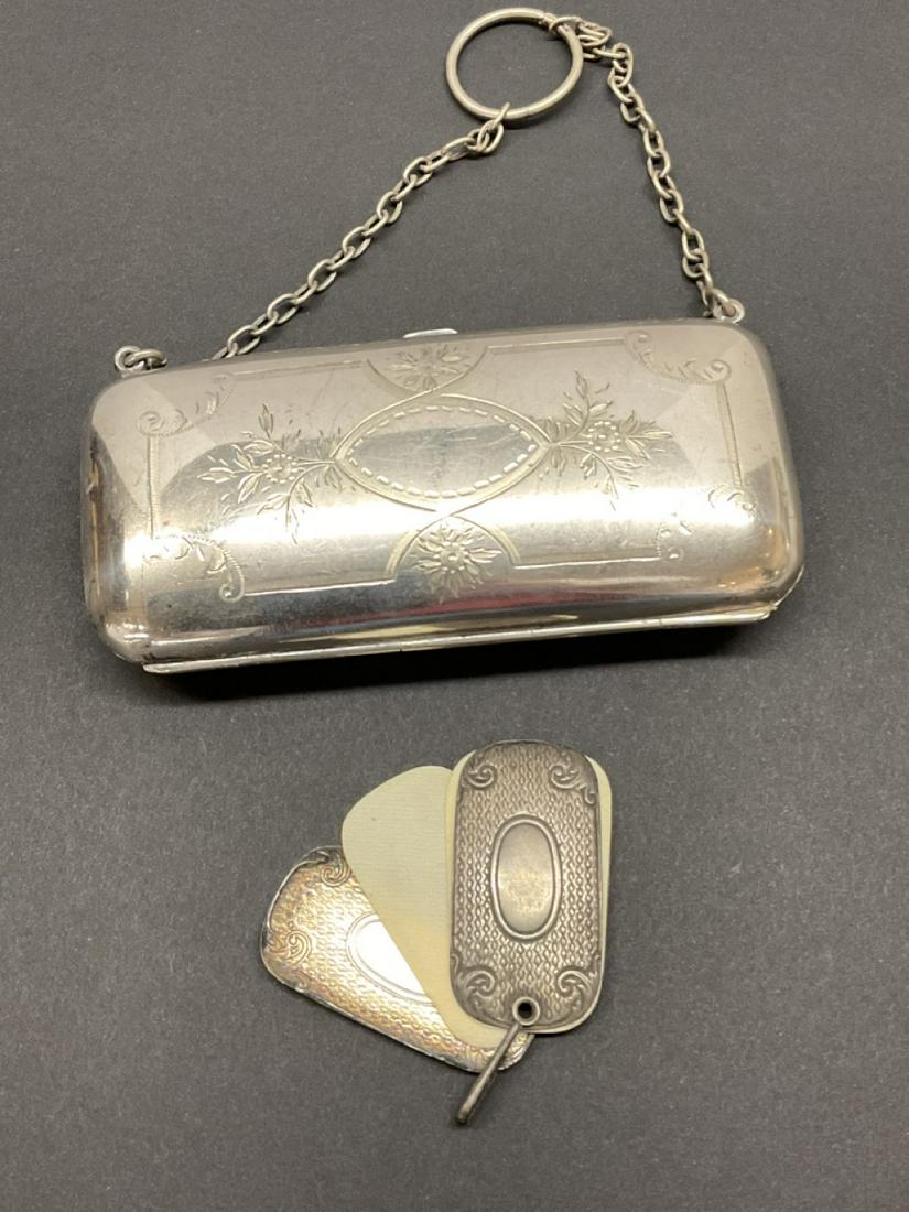 Early 1900's Silver Plated Change Purse And Sterling Notepad: Early 1900's little silver plated change purse and notepad with sterling silver covers. Dimensions 2 1/2” x 5 1/4”