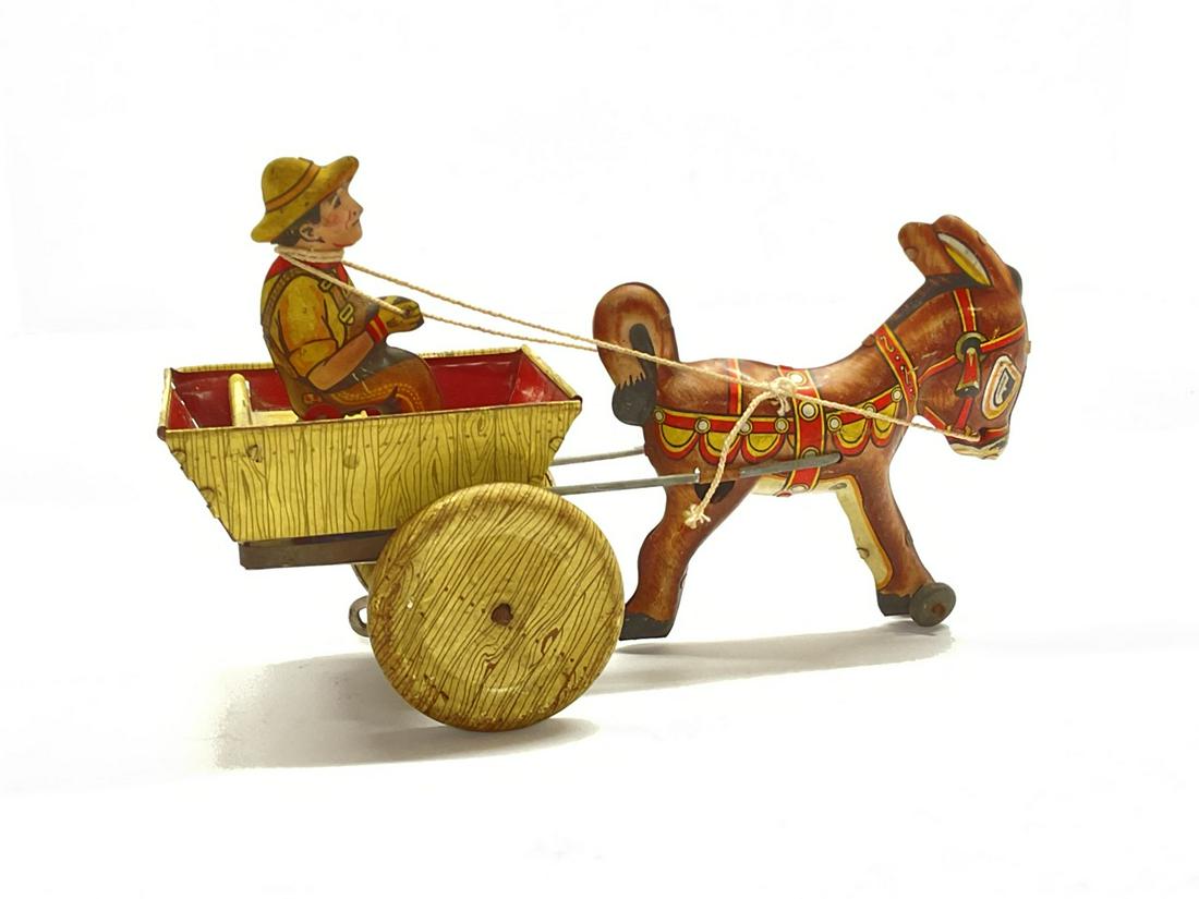 Vintage Marx Tin Toy, Donkey And Cart: Marx Donkey and cart wind up toy. Dimensions: 5" X 8 1/4" X 3 1/2"