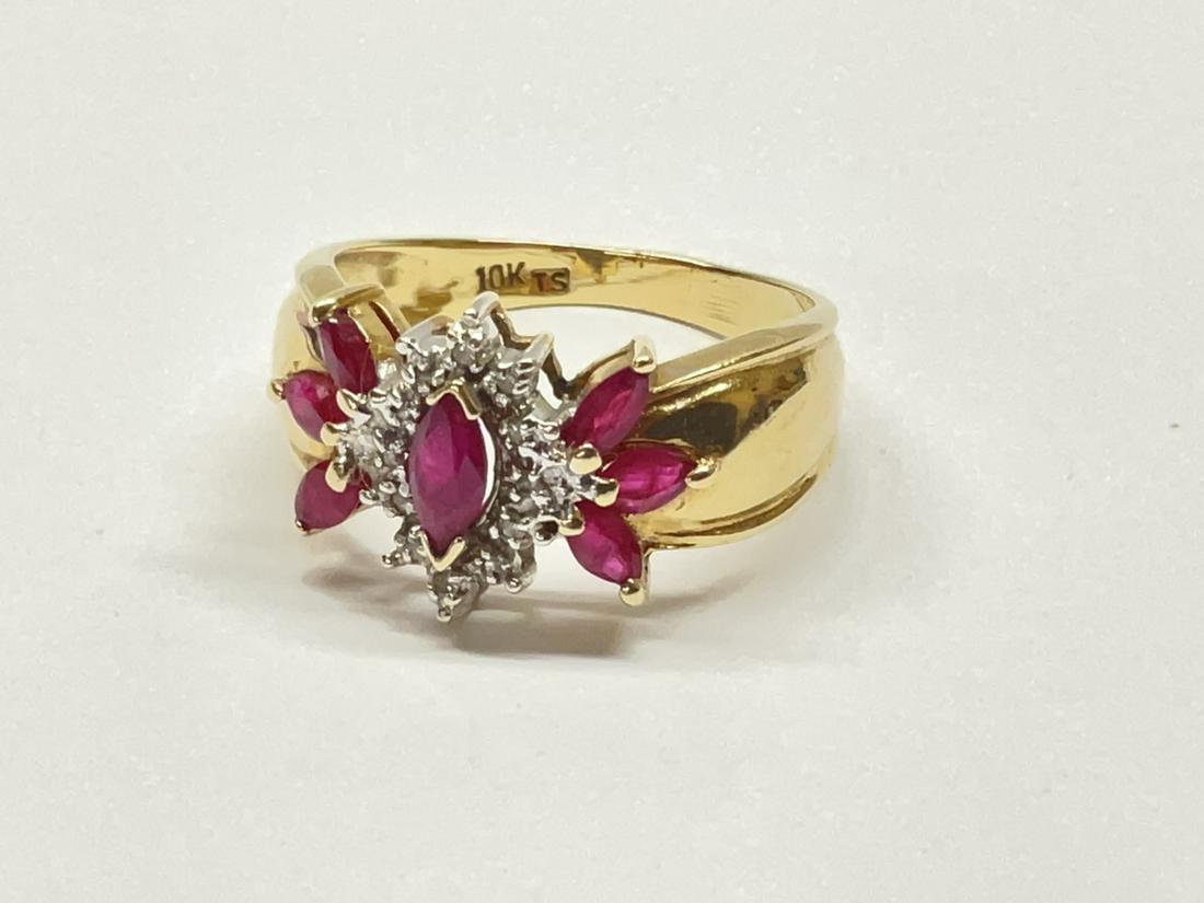 10K Ruby And Diamond Ring: 10K Yellow Gold Ruby And Diamond Ring. Total weight: 3.3 grams Size 8
