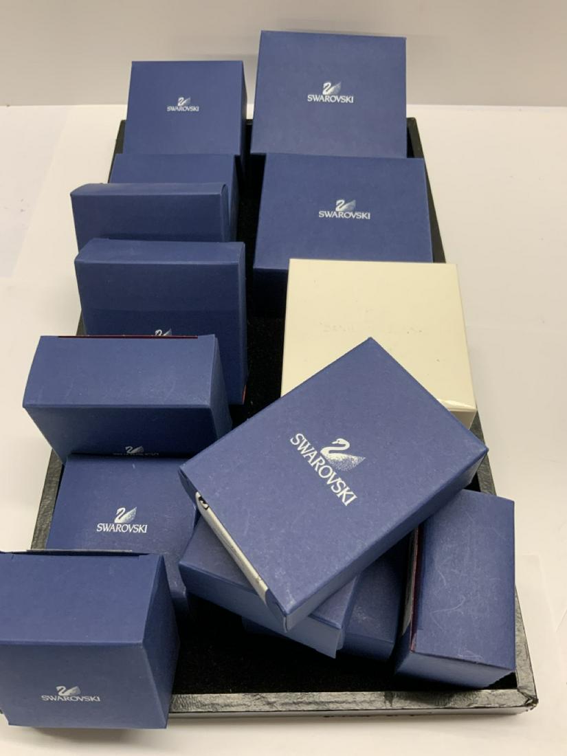Over $565.00 Retail Swarovski Crystal Merchandise: Over $565.00 Retail Swarovski Crystal Boxed itesm. Jewelry, Golf Bag, Wine set, sapphire, high heel shoe etc.