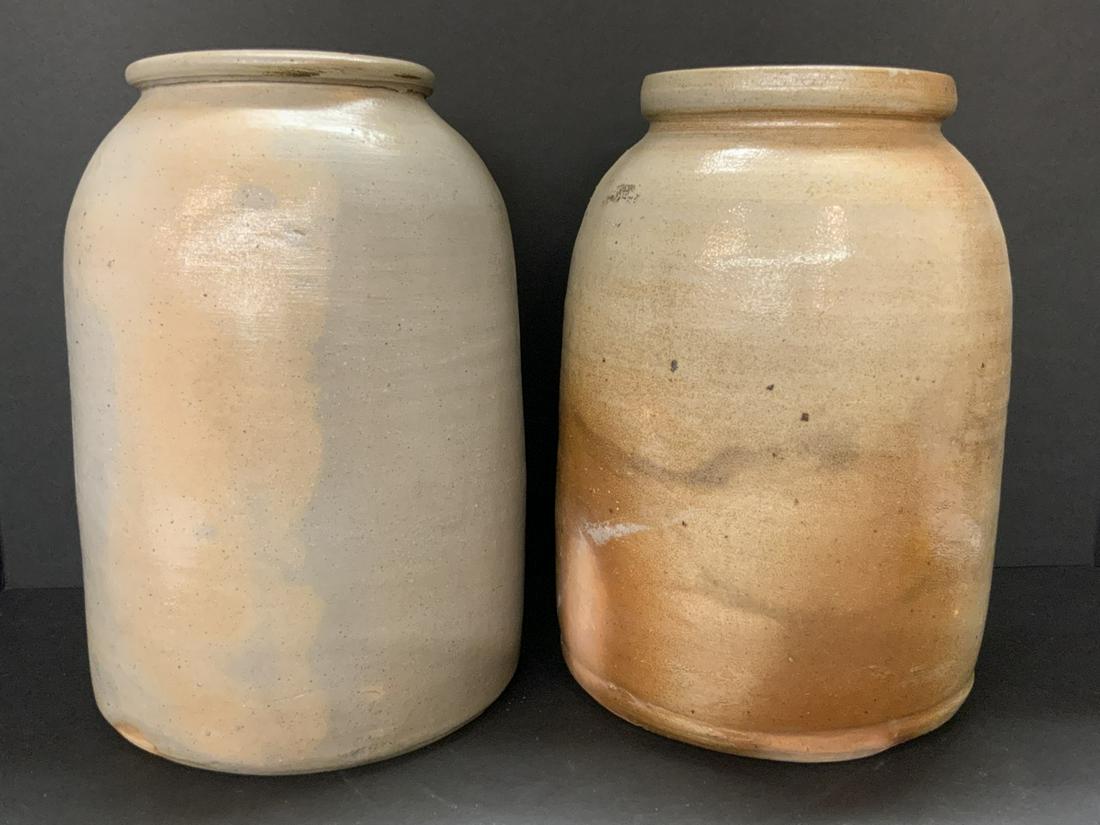 Two (2) Gallon Crocks: Two (2) Gallon CrocksDimensions:11” H x 7 1/2” D , 10 1/2” H x 7” DGood Condition, Some Cracks.Please see Photographs