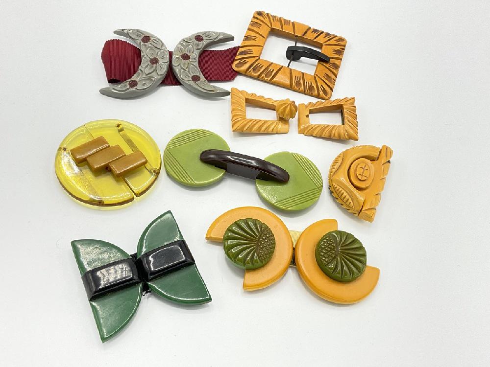 Eight (8) Art Deco Bakelite Belt Buckles: Eight (8) Vintage Art Deco Bakelite Belt Buckles. As seen in photograph preview.