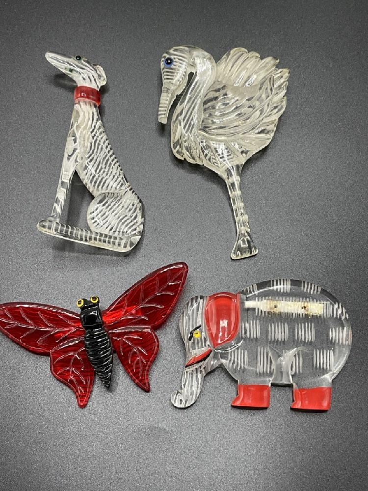 Vintage Reverse Carved Lucite Figural Pins (1 of 3)