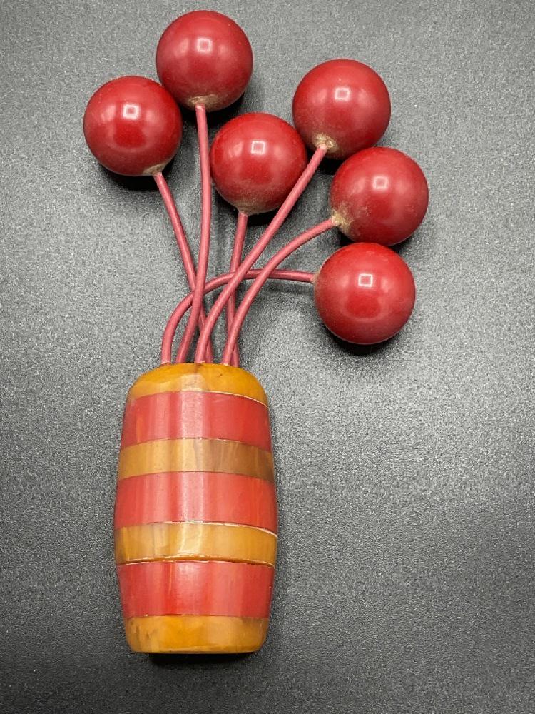 Laminate Bakelite Barrel With Balloons Brooch/Pin: Vintage Laminate Bakelite Barrel With Balloons Brooch/Pin Dimensions: 4 1/2” x 3”