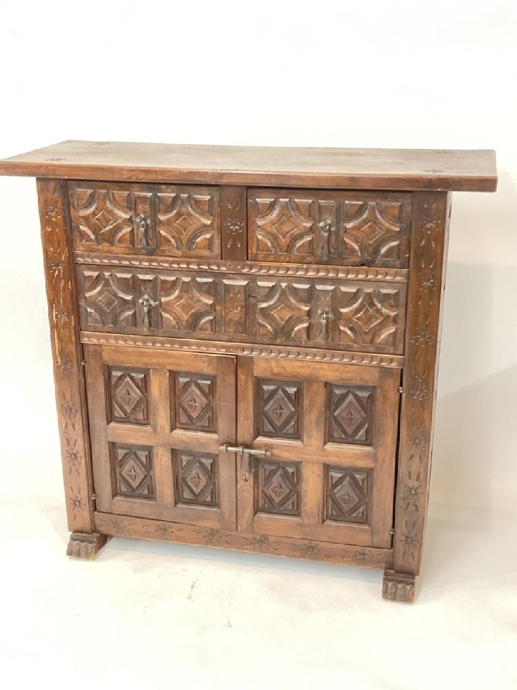 Spanish Carved Antique Two Door Cabinet: Spanish carved antique two door cabinet. Dimensions: 34 1/2” x 37” x 13”