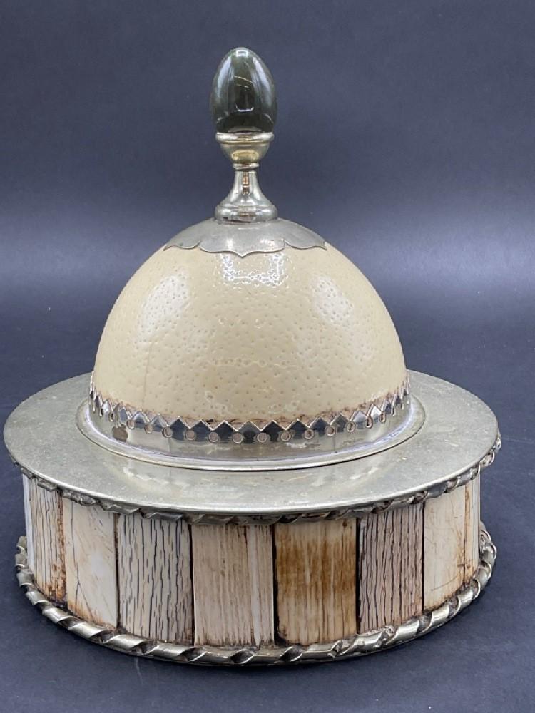 Redmile London Ostrich Egg Box: Redmille London designer Ostrich egg and bone covered box. Some soiling, metal corrosion noted. Cleaning needed. Please see photograph preview.Dimensions 8 1/2” x 7” diameter