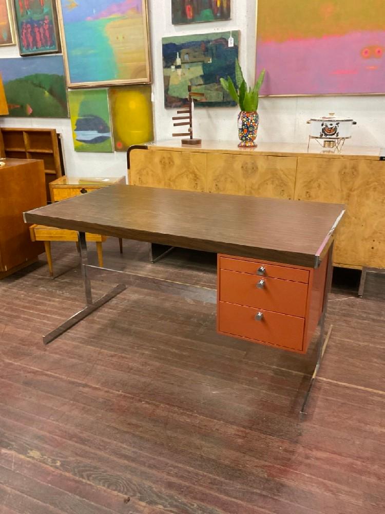 Modern Design Coral Painted Metal and Chrome Desk: Modern Design Coral Painted Metal and Chrome Desk with formica wood top. Very good condition.c.1970's. Dimensions: 29” x 55” x 30”