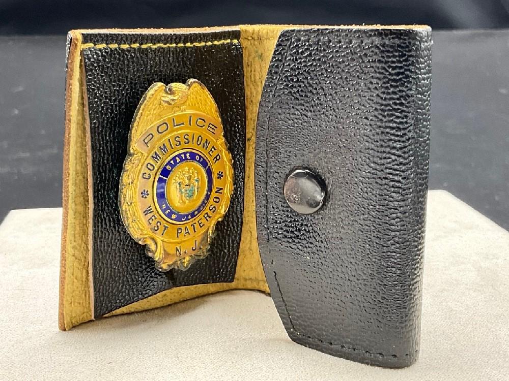 Obsolete Police Commissioners Badge West Paterson New Jersey Commissioner: Obsolete Police Commissioner badge. West Paterson, New Jersey. Housed in leather bifold.
