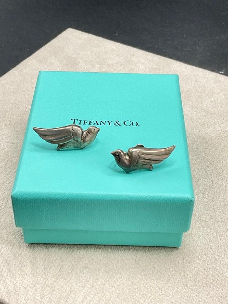 Vintage Tiffany & Co. Sterling Silver Dove Earrings: Tiffany & Co. screw back sterling silver bird (Dove) earrings. Dimensions: 1 1/4"L