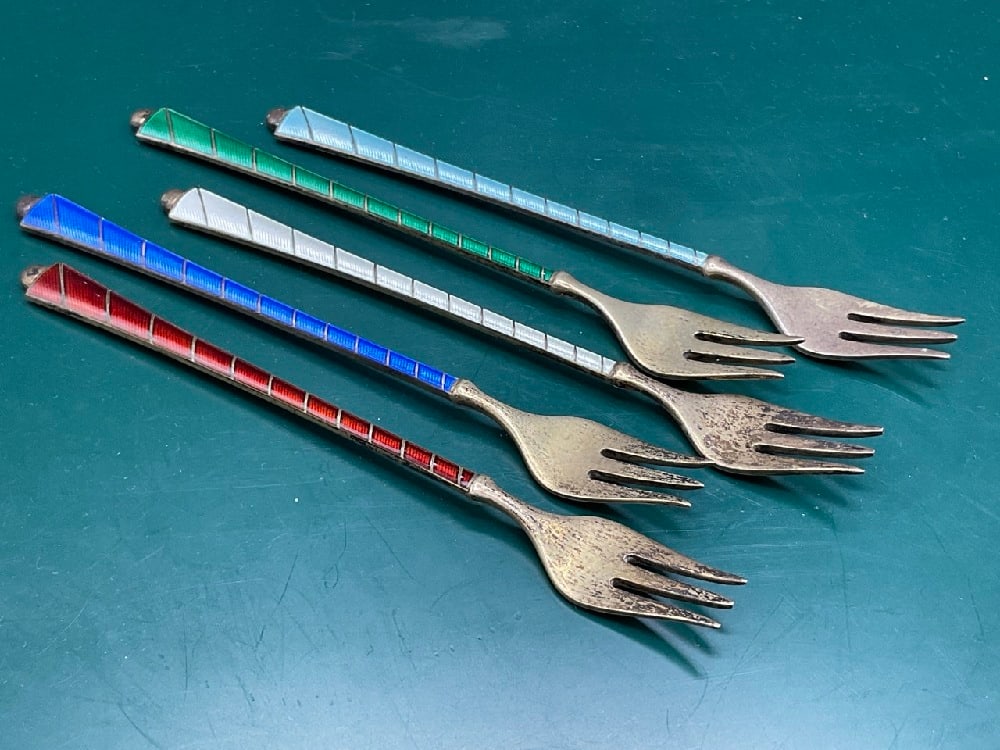 Five (5) Sterling Silver Enameled Forks: Five (5) Sterling silver enameled forks. Denmark 925 Total weight: 2.4 average ounces. Dimensions: 4 3/4" length.