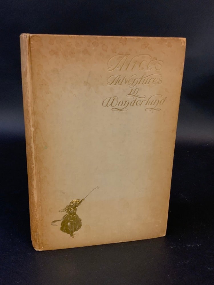 1st Edition Alice in Wonderland by Lewis Carroll: Alice’s Adventures in Wonderland by Lewis Carroll with An Introduction by E.S. Martin Illustrated by Peter NewellNew York and London Harper & Brothers Publishers MCMI Fair Condition (some pages 