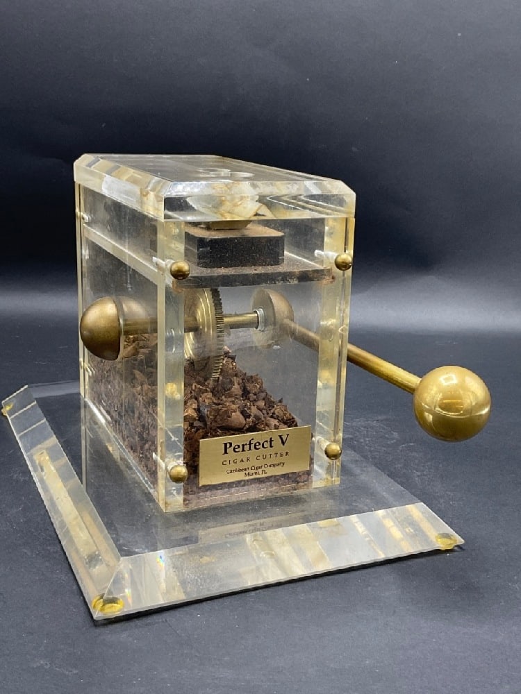 Caribbean Cigar Company, Miami Florida Lucite Cigar Cutter: Caribbean Cigar Company, Miami Florida Lucite Cigar Cutter. Dimensions: 7 1/2" X 7 1/2" X 11"