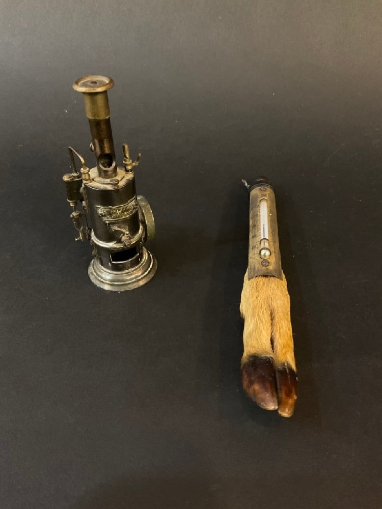 Miniature Steam Engine “Compliments of B.Bing Sons and Deer Hoof Thermometer: Miniature Steam Engine “Compliments of B.Bing Sons and Deer Hoof Thermometer Dimensions.: 4 1/2” H x 2 1/2” W (steam engine) 8” L ( Huff)