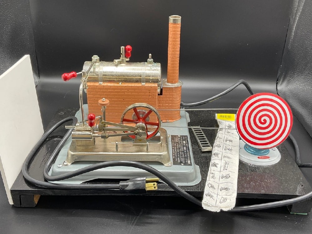 Wilesco Steam Engine Model: Willesco steam engine model number 400. Dimensions: 3 1/2" X 19 1/2” x 12”