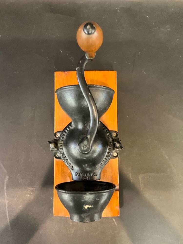 Antique Enterprise MFG Co. Coffee Grinder: Antique Enterprise MFG Co. Coffee Grinder Dimensions: 10” x 5 1/2” x 12”.