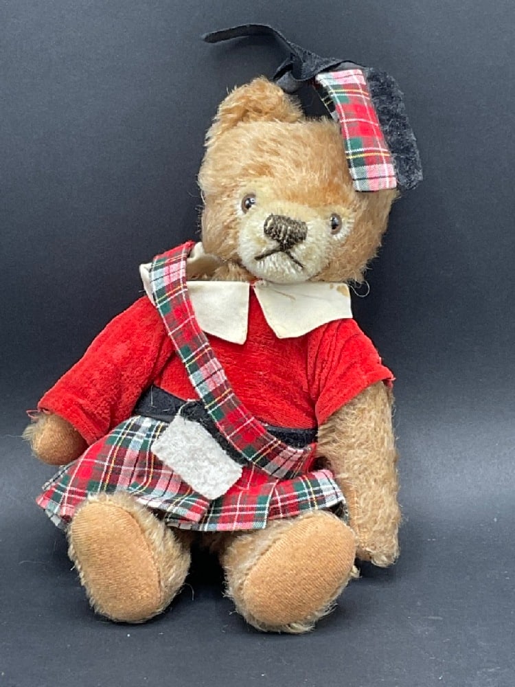 Steiff Scottish Bear: A vintage Steiff Scottish bear. Button present. Dimensions: 9 1/2” x 5” Stain on collar noted.