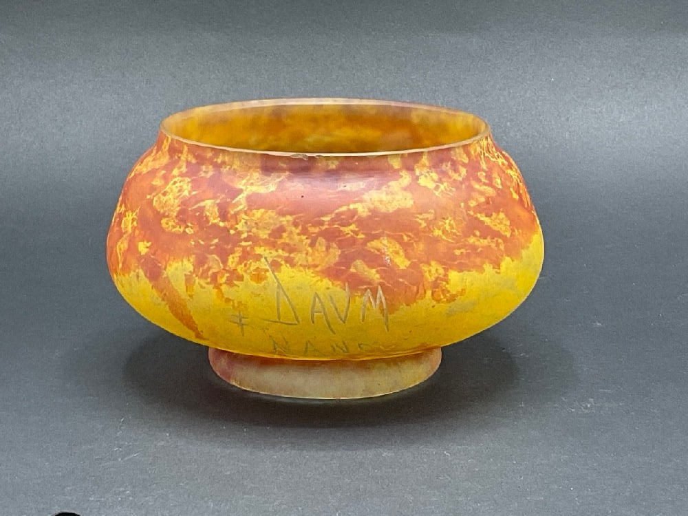 Daum Nancy Art Glass Bowl: Daum Nancy signed art glass bowl. Early 20th century. Small chip noted. Please see photograph preview.Dimensions: 3 1/2” x 6”