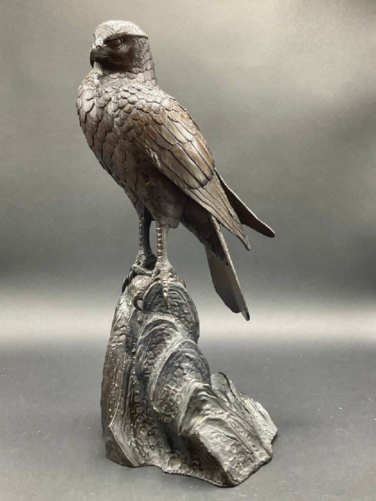 Meiji Period Japanese Bronze Incense Burner: Japanese Meiji period bronze incense burner. Bird-of-Prey (Falcon) perched on top of rock ledge. Two pieces. Removal hatch style door for incense set within wings. Dimensions: 18” x 15”