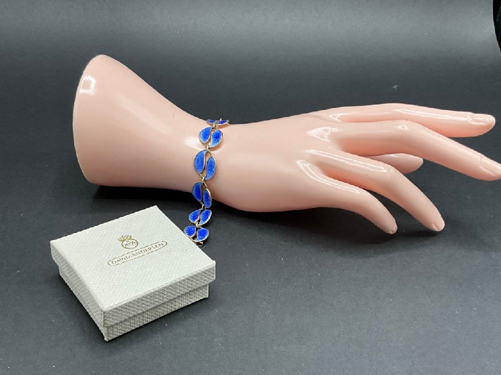 David Andersen Sterling Silver Blue Enameled Bracelet: David Andersen sterling silver blue enameled bracelet. Includes original box. Total weight: 13.31 grams. Dimensions: 7” length.