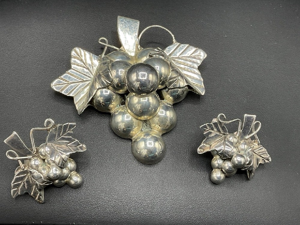 Mexican Sterling Silver Grape Cluster Brooch/Pendant and Earrings Set: Vintage Mexican Sterling Silver Grape Cluster Brooch or Pendant with matching earrings. Total weight: 51 grams. Dimensions: 2 3/4” x 3 1/4” and 1 1/2” earrings
