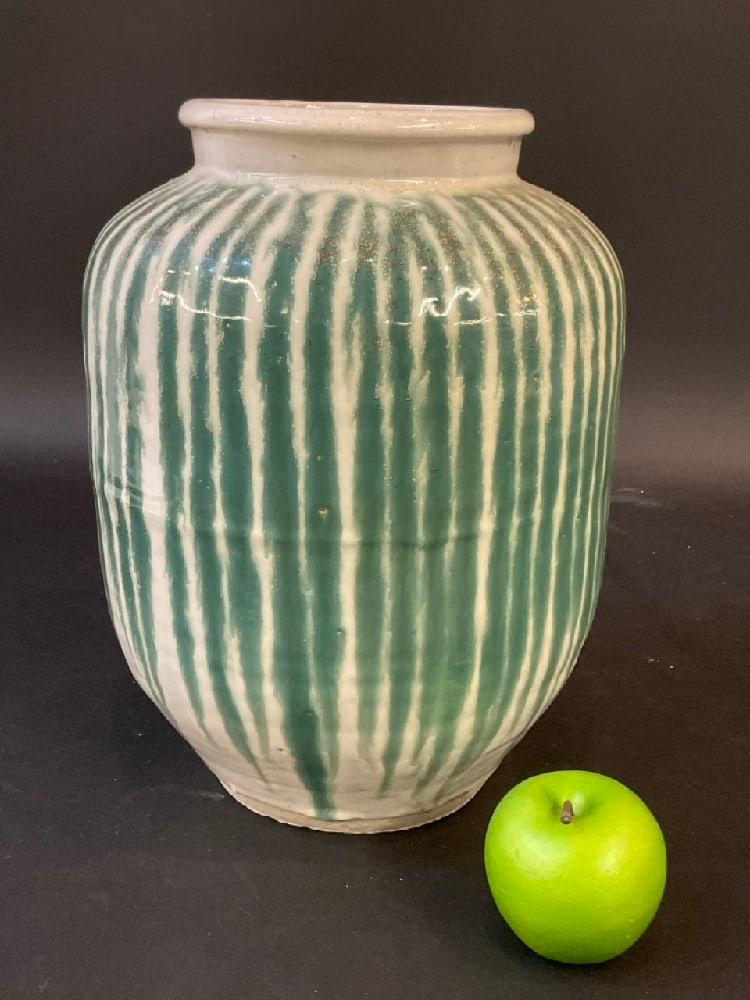 Green and White Striped Pottery Vase: Green and White Striped Pottery Vase.Dimensions: 13” x 9 1/2”