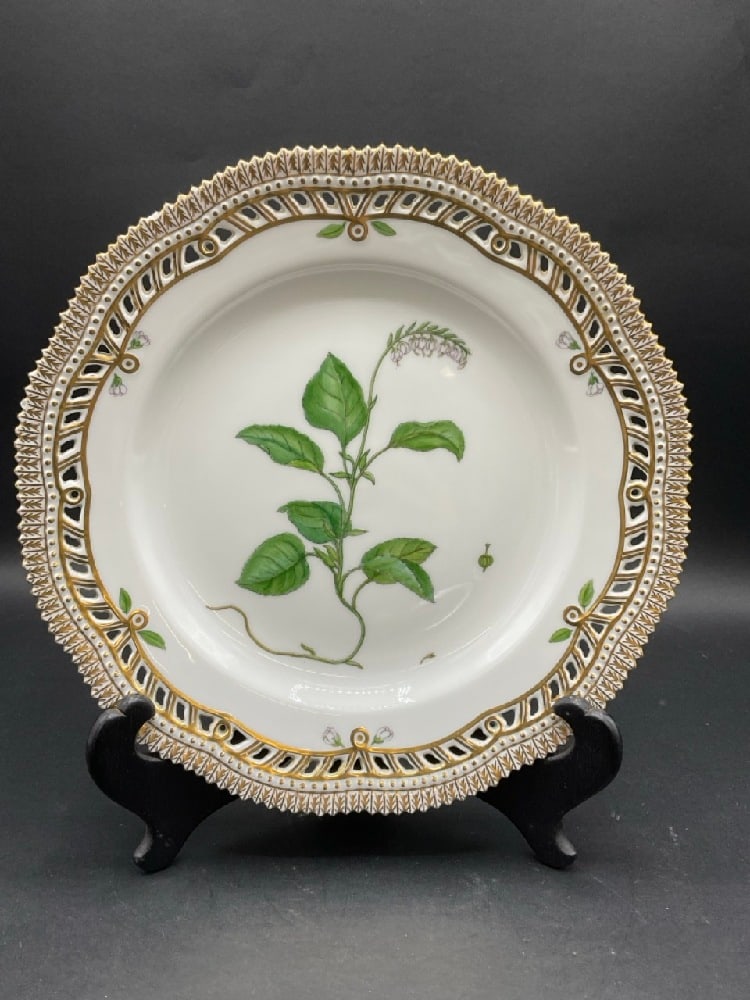Flora Danica Royal Copenhagen Porcelain Dinner Plate, Pyrola Secunda: Flora Danica Royal Copenhagen, Pyrola Secunda, Dimensions: 10" diameter. Condition: two small flea bite chips, scratch and wear to green leaf see images