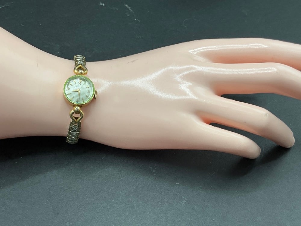 Vintage Lady's 14K Gold Omega Wristwatch w/ Green Crystal (1 of 6)