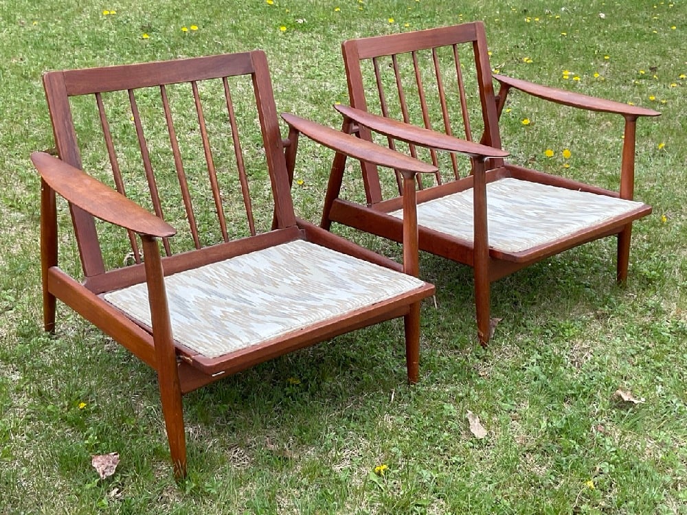 A Pair, MCM Danish Modern Teakwood Lounge Chairs: A Pair, MCM Danish Modern Teakwood Lounge Chairs. Restoration Needed. Please see photograph preview of damage. Cushions are replaced and in clean condition. No dry rot present. Dimensions: 26” x