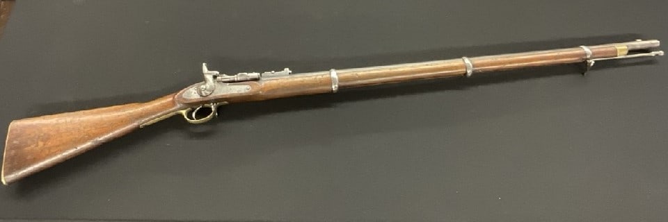 An Enfield 1871 Percussion Carbine Rifle, 19th Century: An Enfield 1871 Percussion Carbine Rifle, 19th Century. Dimensions: 55” L Serial no. 8599.