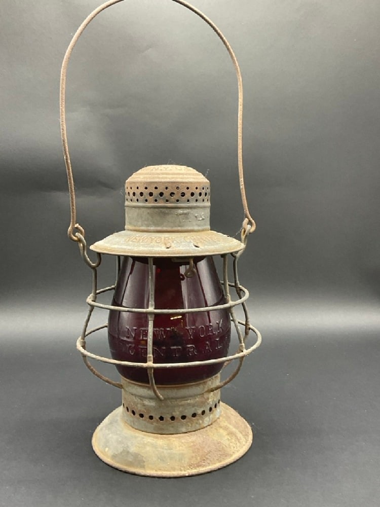 Dietz #6 New York Central Railroad Lantern: Dietz #6 New York Central Railroad Lantern. Embossed Written New York Central present to ruby glass globe. Provenance: Collection from The Estate of Glen Morris.